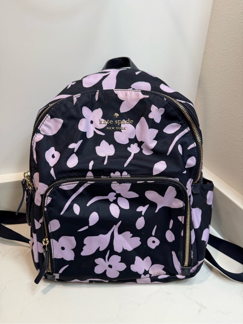 Kate Spadr deep Navy and lavender Backpack with Light Pink Floral Print